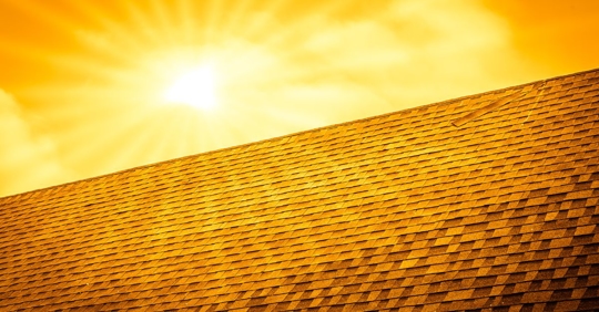 summer sun over roof
